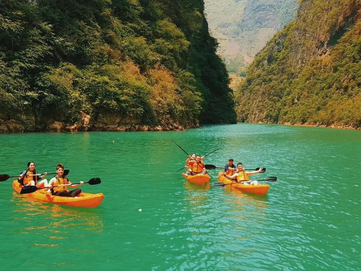 Kayaking is an interesting activity when exploring Nho Que River