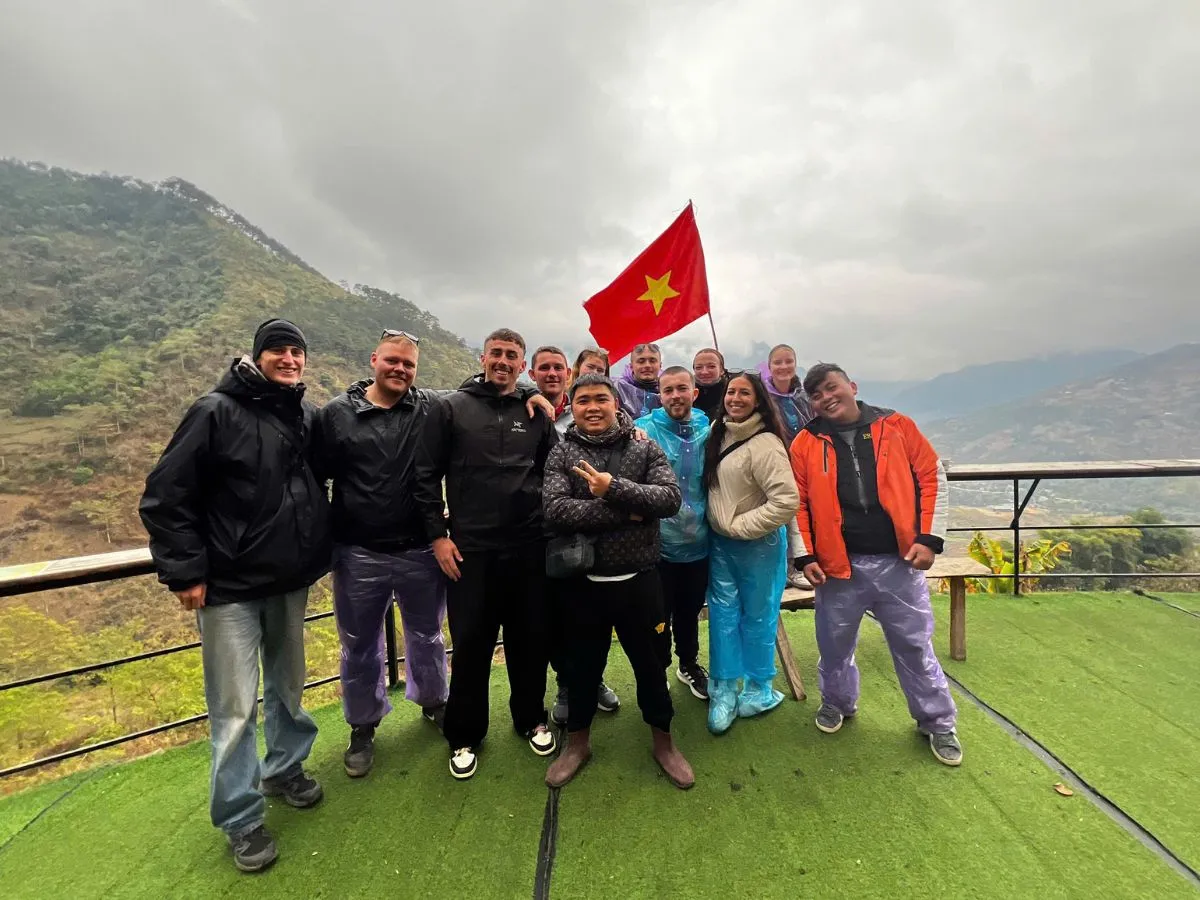 Happy group after riding safely, showing ha giang loop accidents can be avoided