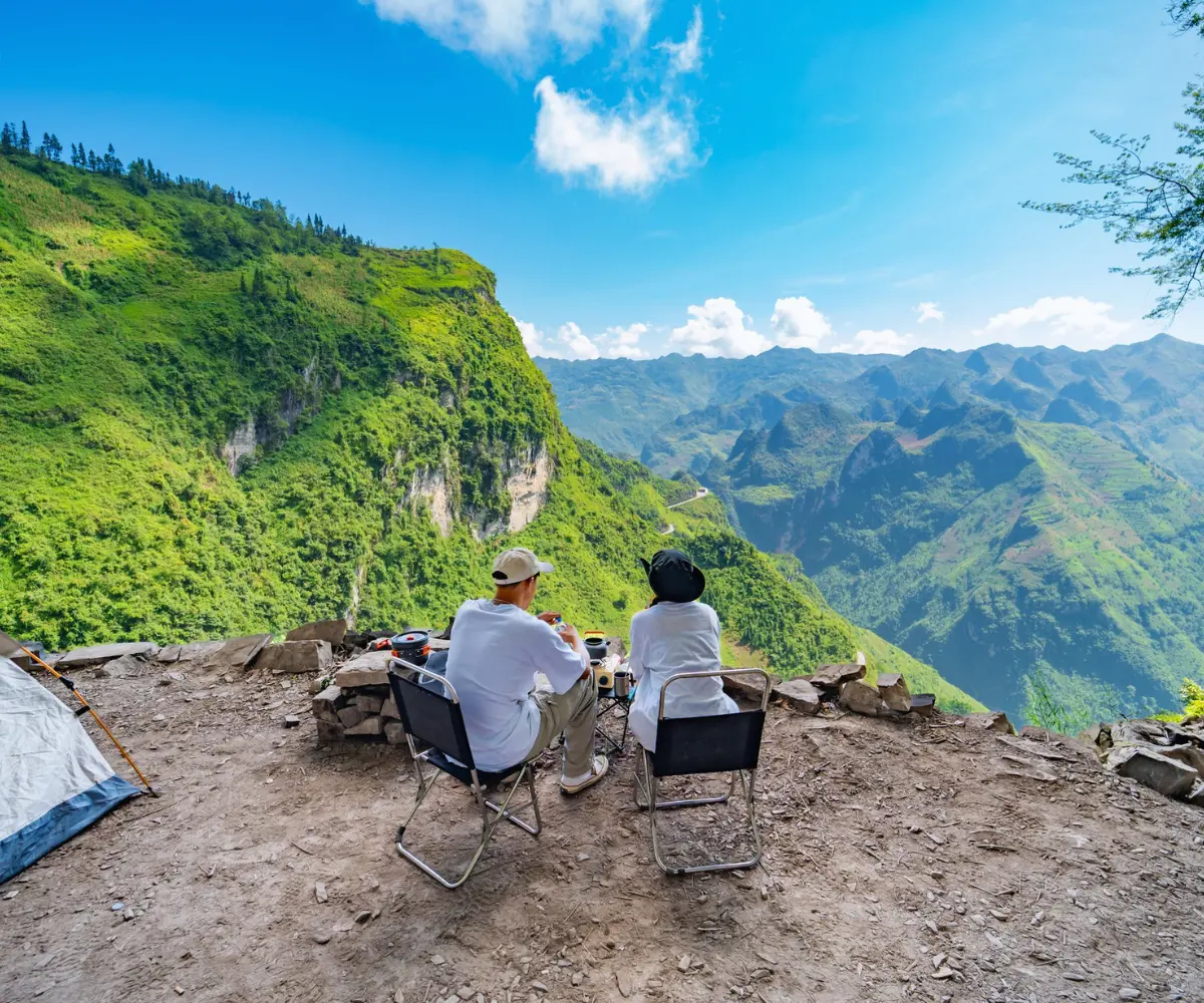 The Ha Giang Loop route features breathtaking mountain passes, towering rocky peaks