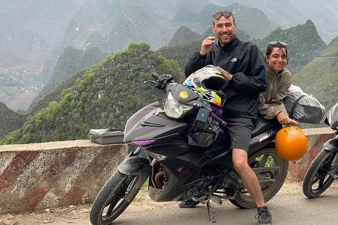Tourist enjoying a 3-day adventure in Ha Giang with stunning mountain views – Ha Giang Travel Guide: How Long Should You Spend?