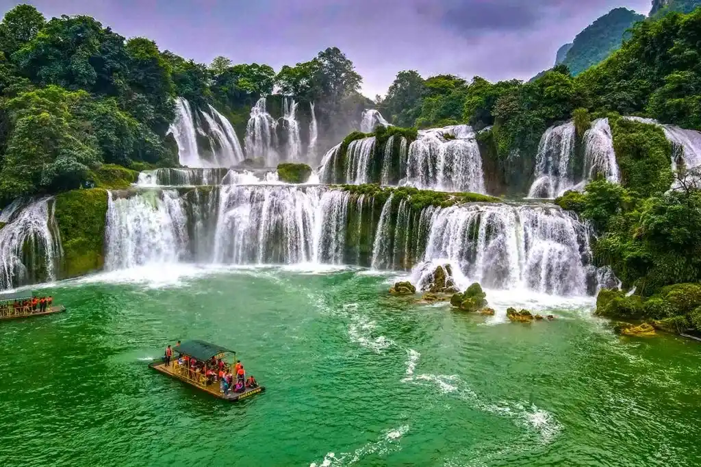 Ban Gioc Waterfall flowing between Vietnam and China, a key stop on the Cao Bang Loop vs Ha Giang Loop