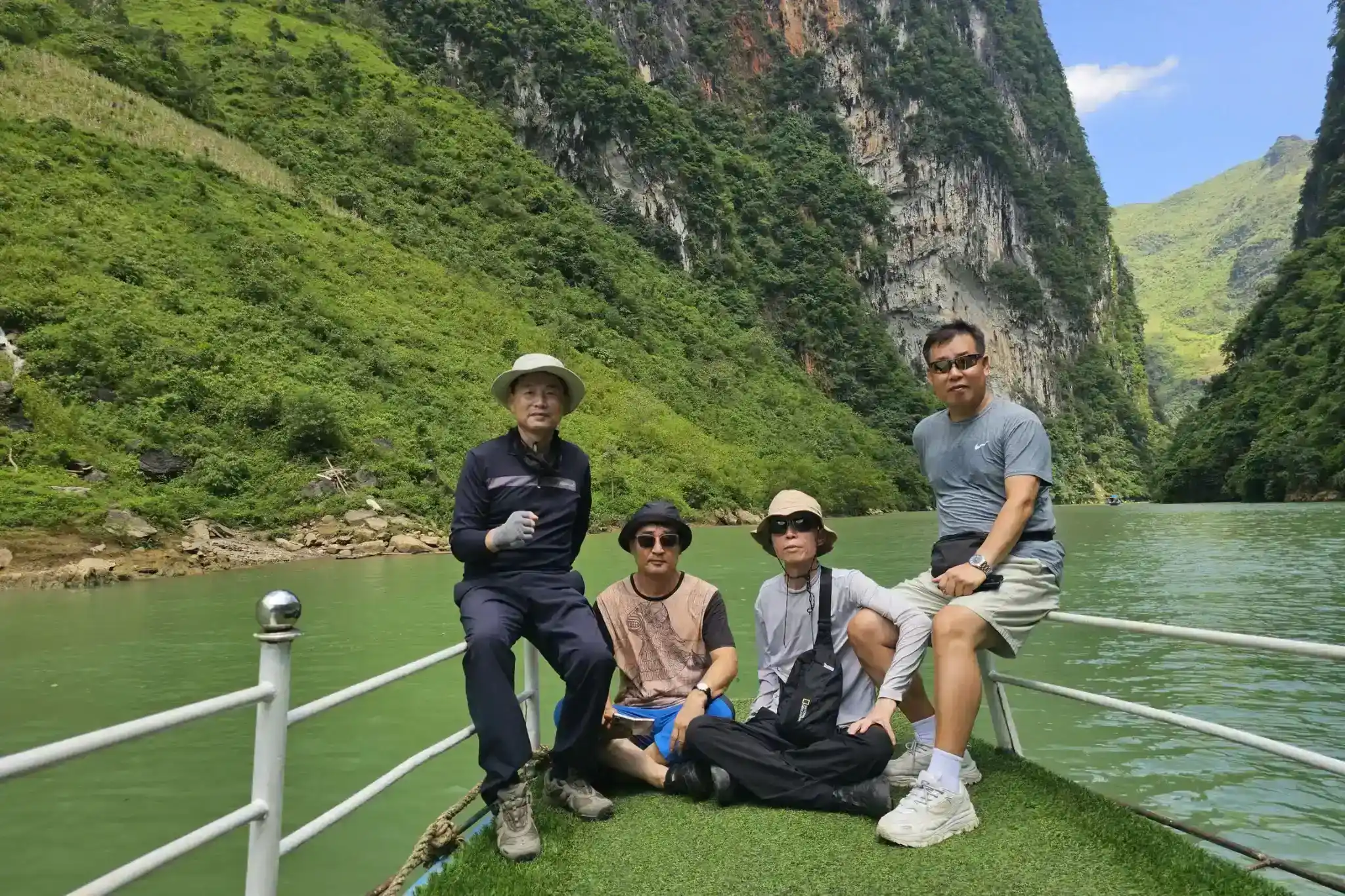 Overview of Nho Que River surrounded by dramatic cliffs in Ha Giang