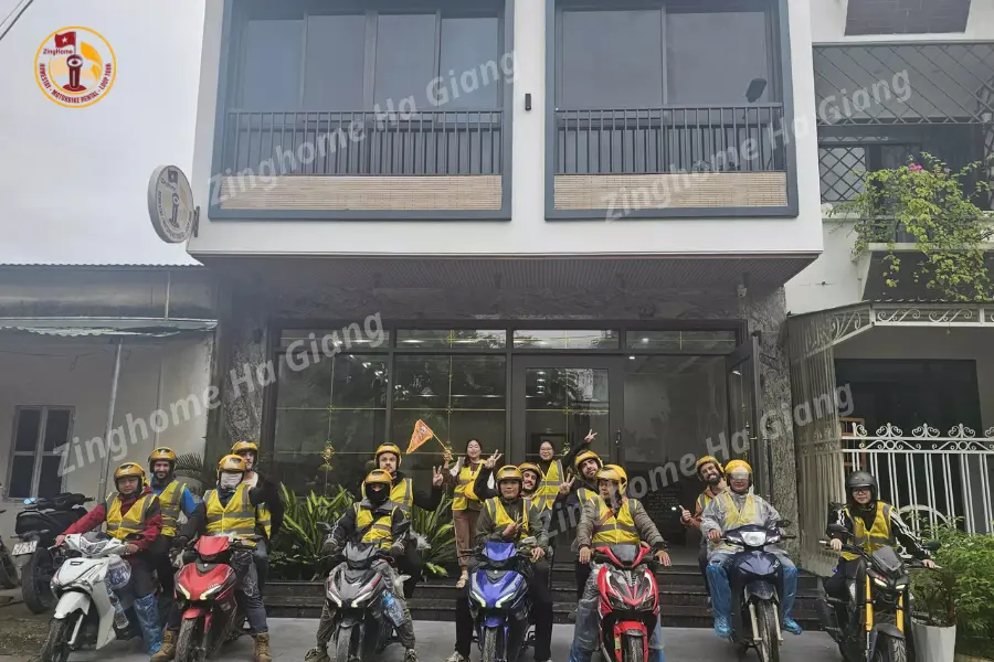 A group of young travelers enjoying a Ha Giang motorbike tour
